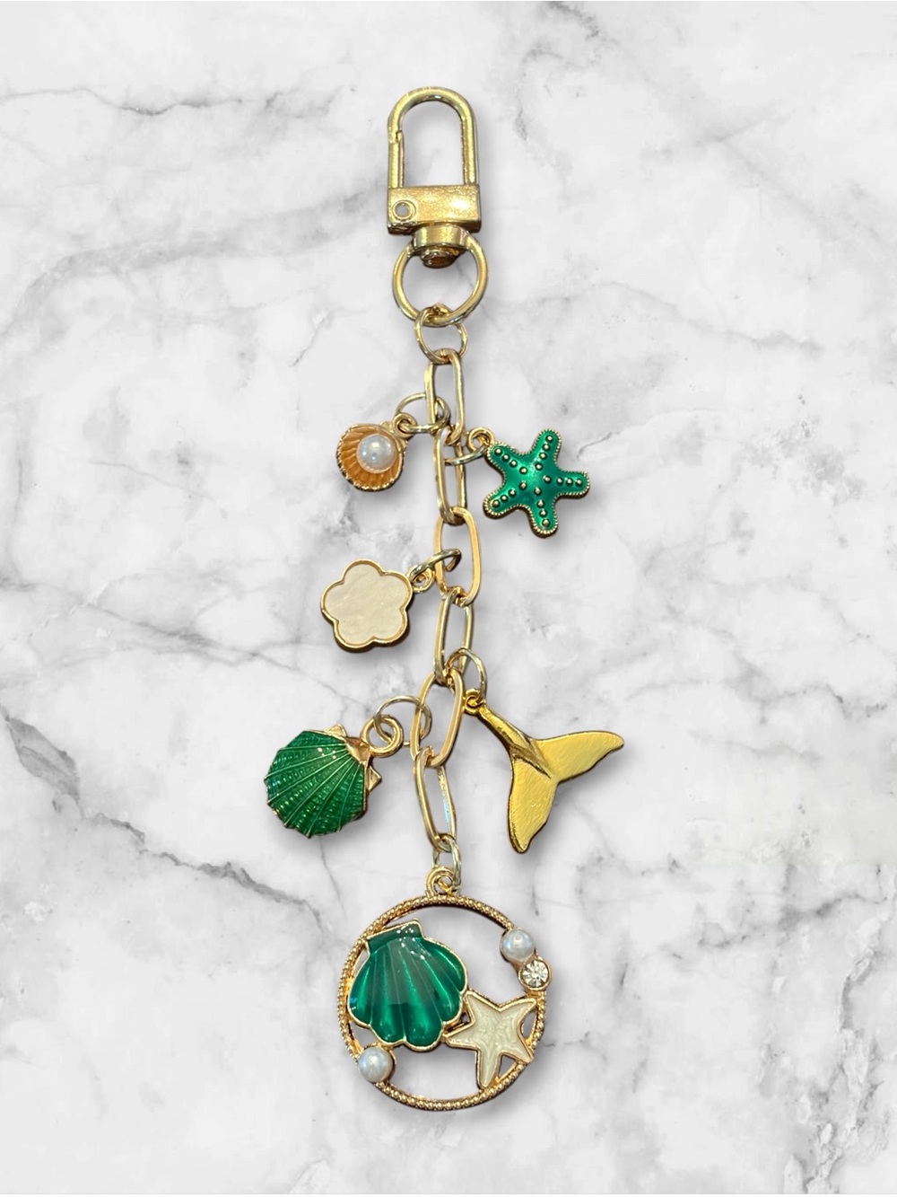 Gold-tone Sea Bag Charm with Green Accents